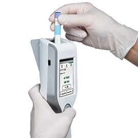 hands with gloves hold 3M™ Clean-Trace™ Hygiene Monitoring and Management System