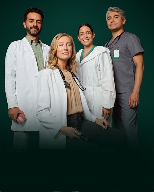 Health care professionals posing in uniform.